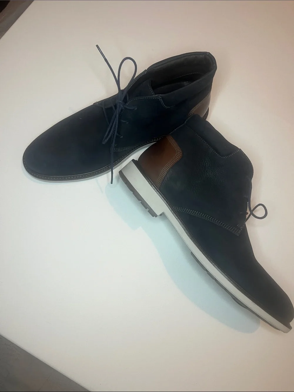 Men's  Johnston & Murphy Navy Chukka Boots with Brown Heel Accent, size 9M